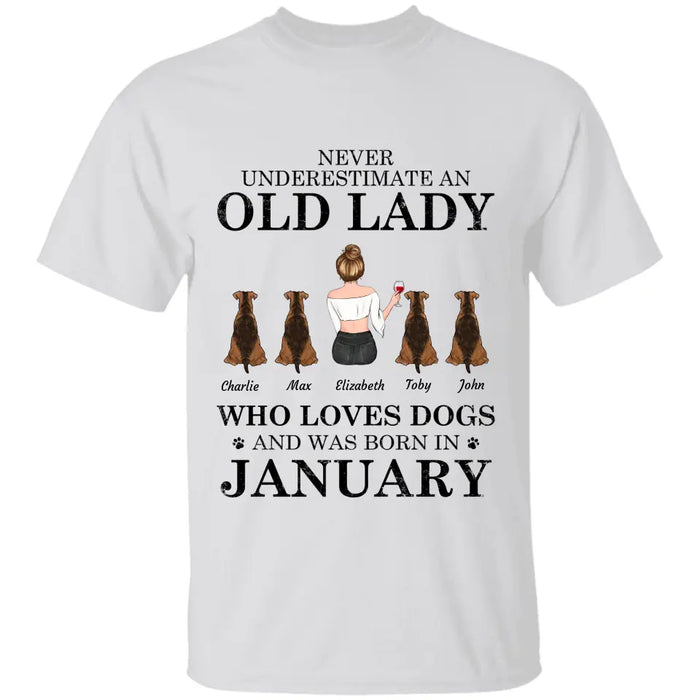 "Never underestimate an old lady who loves Dogs/Cats and was born in " girl and dog,cat, month personalized T-Shirt