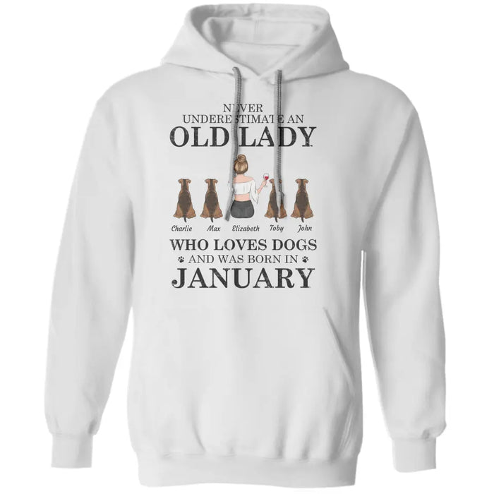 "Never underestimate an old lady who loves Dogs/Cats and was born in " girl and dog,cat, month personalized T-Shirt