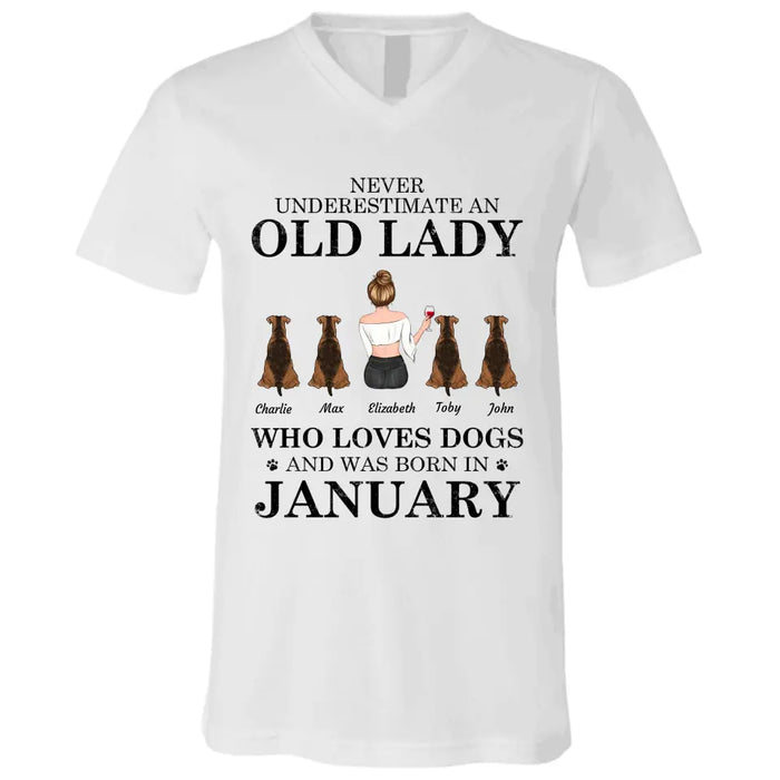 "Never underestimate an old lady who loves Dogs/Cats and was born in " girl and dog,cat, month personalized T-Shirt