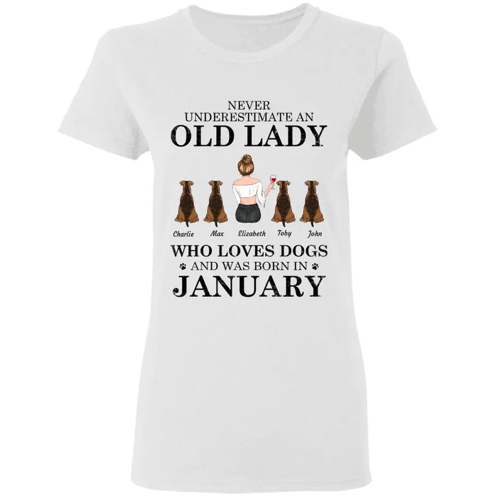 "Never underestimate an old lady who loves Dogs/Cats and was born in " girl and dog,cat, month personalized T-Shirt