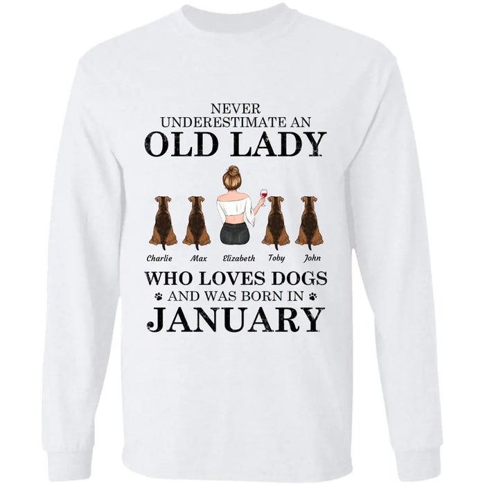 "Never underestimate an old lady who loves Dogs/Cats and was born in " girl and dog,cat, month personalized T-Shirt